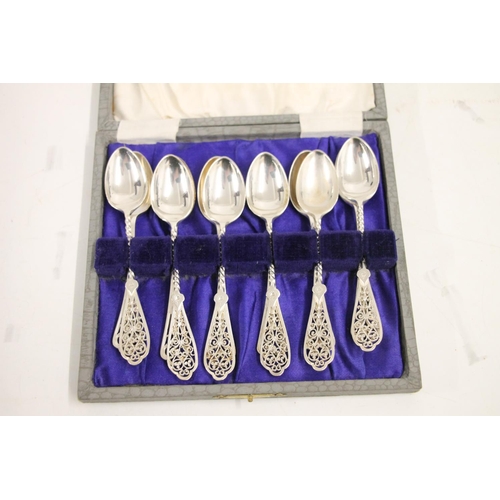 596 - Set of six silver teaspoons with twist stems and reticulated terminals, Sheffield 1899, 69g, togethe... 