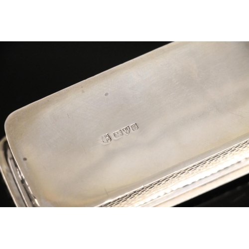 603 - Edward VII silver table snuff box of planished rectangular form with gilt interior, James Deakin &am... 