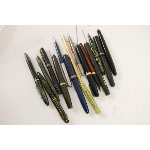 607 - Vintage fountain and other pens to include a Sheaffer 400, a Sheaffer 275, a Parker Duofold, etc.