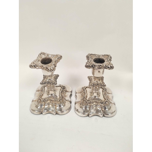 61 - Pair of old Sheffield plated table candlesticks c1810, 21cm, and a pair of dwarf candlesticks, chamb... 