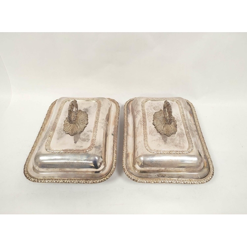 63 - Pair of old Sheffield plated rectangular entrée dishes with gadrooned edges with covers, handles and... 