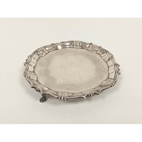 64 - Silver circular card tray with shaped moulded edge on pad feet, initialled by W Peaston 1749, 15.5cm... 