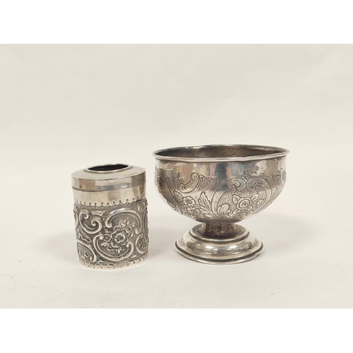 66 - Silver hemispherical bowl, embossed with scrolls, 1907 and a bottle holder. 222g. (2)