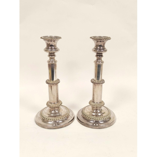 81 - Pair of old Sheffield plated sliding candlesticks with gadrooned edges c1815, 19cm, closed.