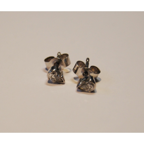 93 - Pair of diamond ear studs, each a pear-shaped brilliant, 18ct white gold, 5mm.