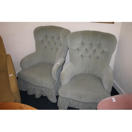 655 - Pair of green upholstered deep button back armchairs.