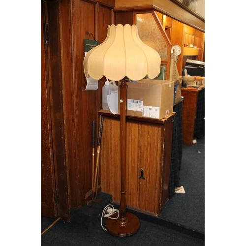 660 - Mahogany standard floor lamp.