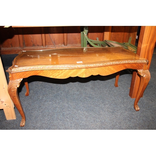 664 - Walnut coffee table with glass top.