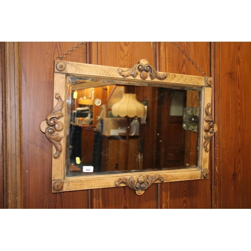 665 - Wooden framed wall mirror, 81cm wide.