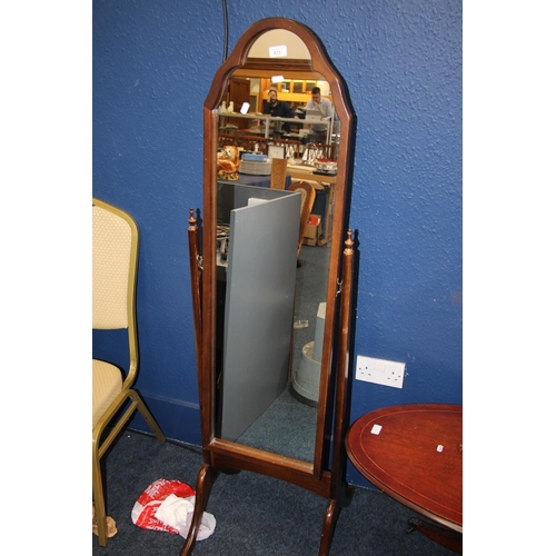 673 - Mahogany floor standing swing mirror, 153cm high.