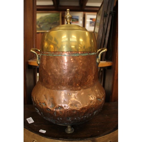 677 - Copper and brass two handled urn, H42cm