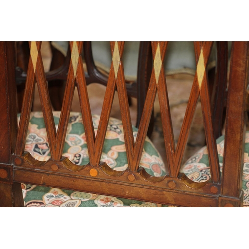 679 - Pair of Edwardian mahogany carvers with pierced trellis backs, and three matching dining chairs.