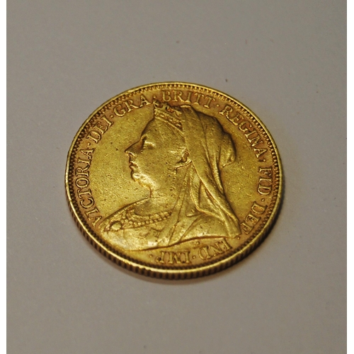 161 - Gold sovereign, 1898, also a leather sovereign purse and a shilling, 1880.