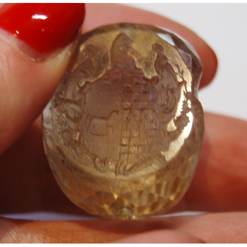 102 - Georgian gold-filled seal with a foiled crest, a crested quartz seal swivel and a scarf pin.