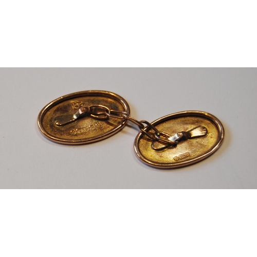 108 - Pair of 9ct gold cufflinks (2.6g), a gold gem-set watch key and a mourning brooch.