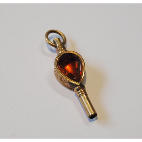 108 - Pair of 9ct gold cufflinks (2.6g), a gold gem-set watch key and a mourning brooch.