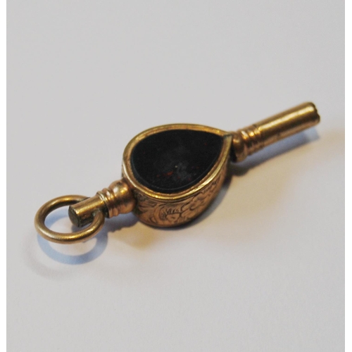 108 - Pair of 9ct gold cufflinks (2.6g), a gold gem-set watch key and a mourning brooch.