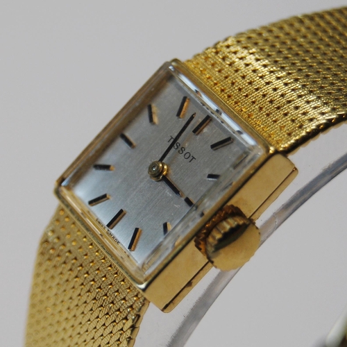 179 - Lady's Tissot 18ct gold watch with square dial, on integral Milanese bracelet, 41g including movemen... 