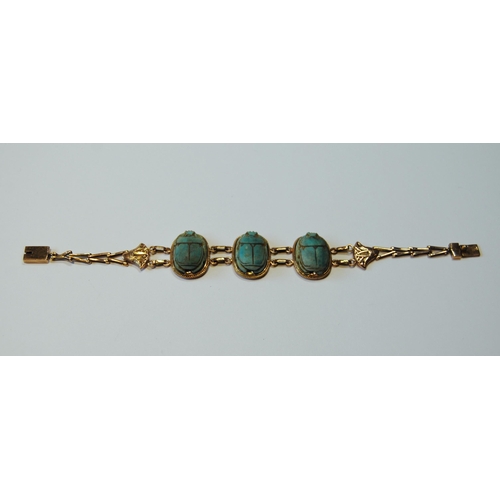 116 - Egyptian gold bracelet with three scarabs, probably 9ct, c. 1920.