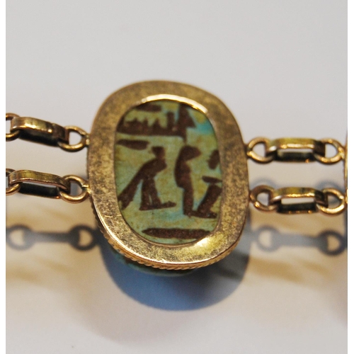 116 - Egyptian gold bracelet with three scarabs, probably 9ct, c. 1920.