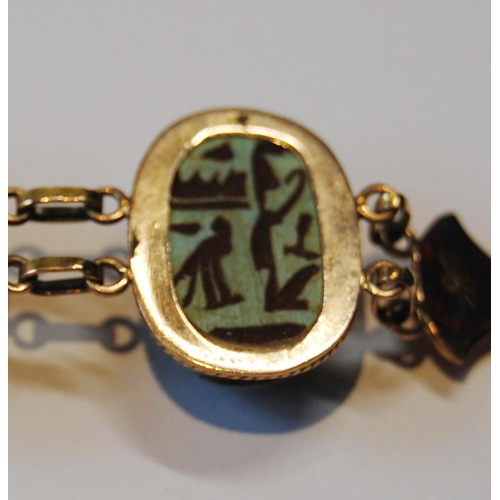 116 - Egyptian gold bracelet with three scarabs, probably 9ct, c. 1920.