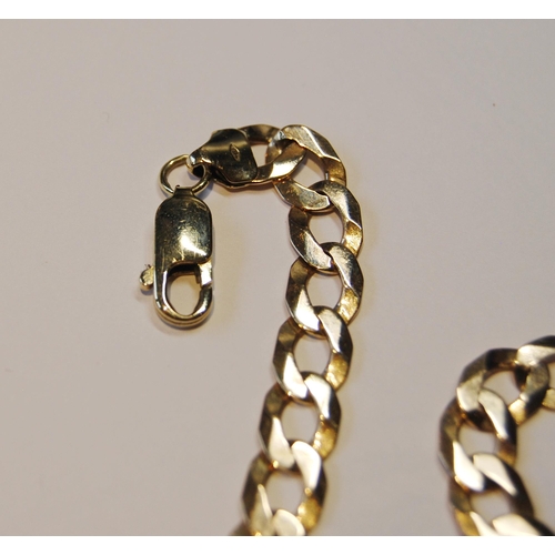 135 - 9ct gold bracelet of filed curb pattern, 13.3g.