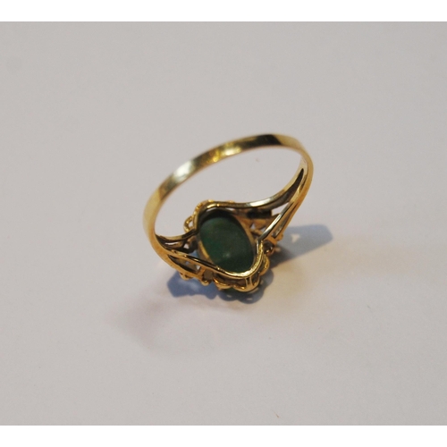 141 - Jadeite ring in gold, probably '18', size O.