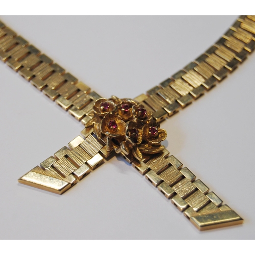 148 - 9ct gold necklace of textured brick pattern, with gem-set slide, 50g gross.