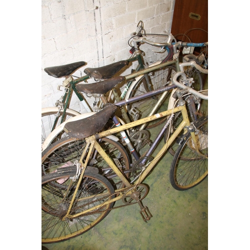 618 - Four vintage racing bicycles.