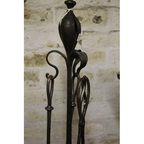 627 - Early 20th century wrought iron companion set.