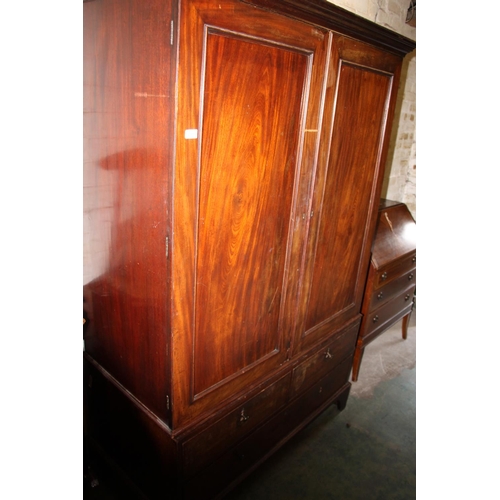 641 - Late Georgian mahogany two piece linen press, 191cm high.