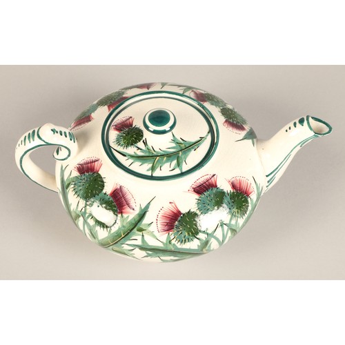 24 - Wemyss ware teapot decorated with thistles with impressed and painted mark. height 9.5cm and a Wemys... 