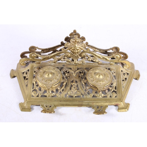 260 - Late Victorian brass desk ink stand, 29cm wide.