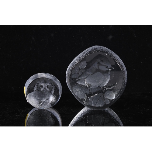 264 - Two Mats Jonasson glass paperweights.