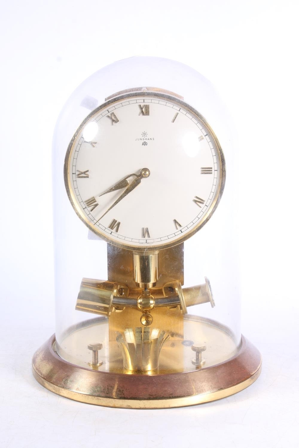 Junghans brass mantel clock under glass dome 27cm high