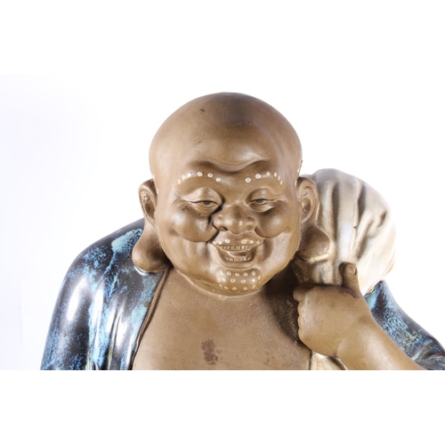 272 - Chinese partially drip glazed model of Pu Tai the laughing buddha,  40cm.