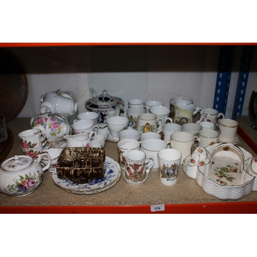 376 - Decorative ceramics to include commemorative cups, an Aynsley floral decorated teapot, etc.