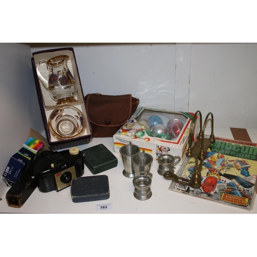 382 - Rolled gold cufflink and button set, vintage Christmas baubles, a Kodak camera, pewter measures, etc... 