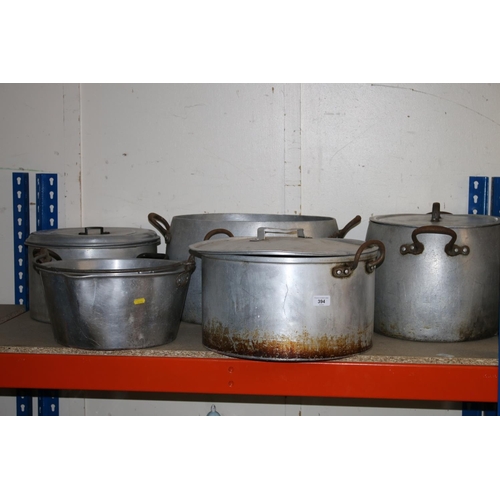 394 - Large aluminium pots.