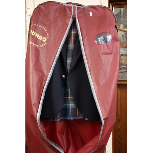 396 - Bonnie Prince Charlie jacket and a kilt with kilt pin.