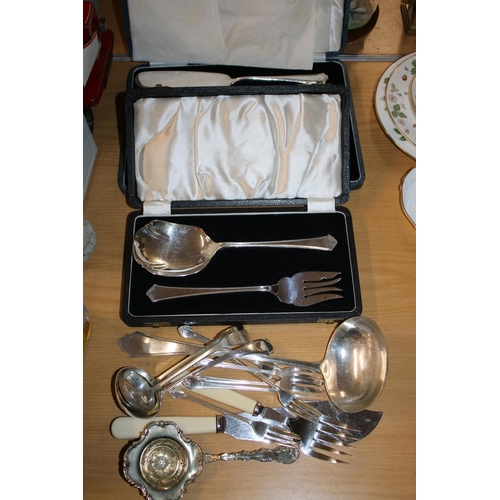 413 - Silver-plate to include a dessert set, a ladle, a toddy ladle, etc.