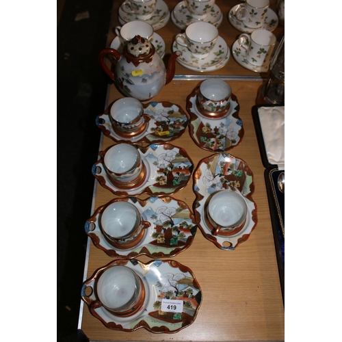 419 - Oriental cups, plates and a teapot.