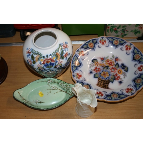 423 - Royal Worcester dish, a leaf jug and two others.  (4)