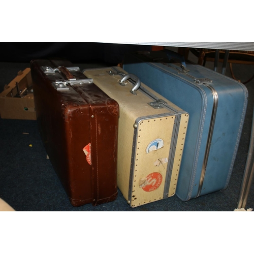 363 - Three vintage suitcases.