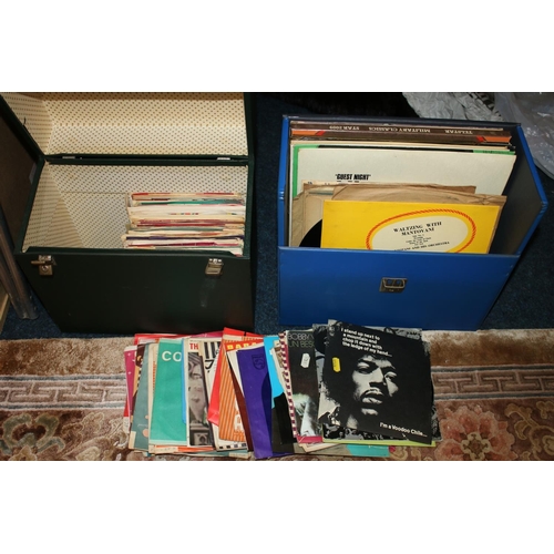 364 - Two cases containing records and singles to include The Jimi Hendrix Experience Voodoo Chile single ... 