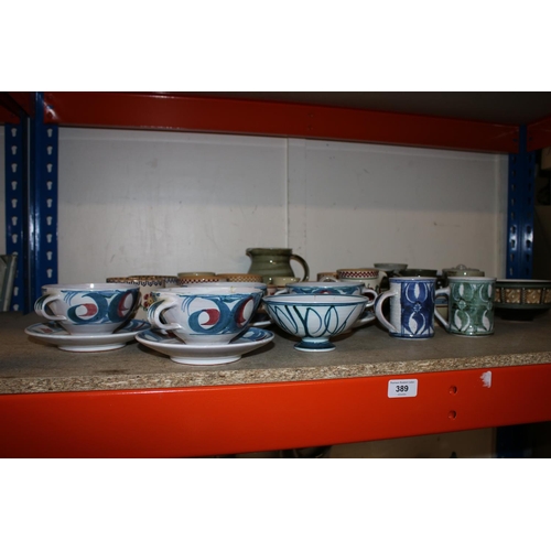 389 - Studio pottery in the manner of Alan Caiger Smith to include four soup coupes, saucers and a bowl si... 