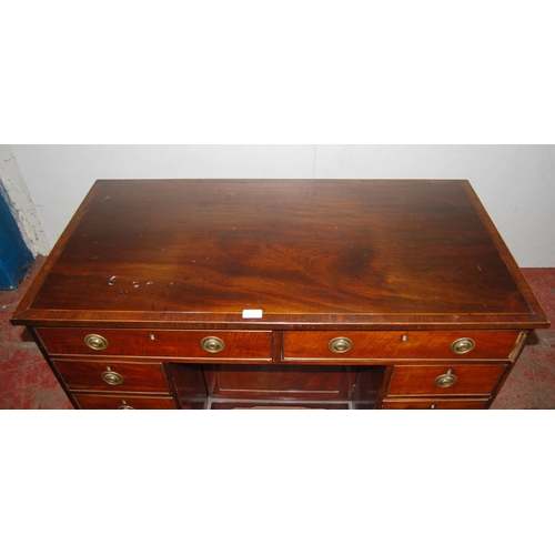 440 - Regency Revival inlaid mahogany kneehole desk, c. early 20th century, with two short drawers above t... 