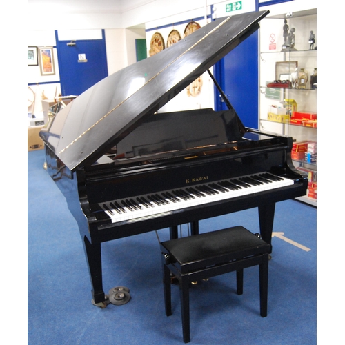 257 - K. Kawai black lacquered grand piano, model KG-2C, c. 1970s, serial no. 1062299, approximately 6ft, ... 