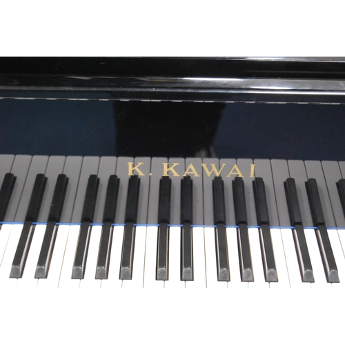 257 - K. Kawai black lacquered grand piano, model KG-2C, c. 1970s, serial no. 1062299, approximately 6ft, ... 