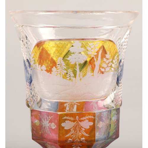 227 - Bohemian glass beaker with engraved hunting scene, clear with pink,blue and amber flashed decoration... 